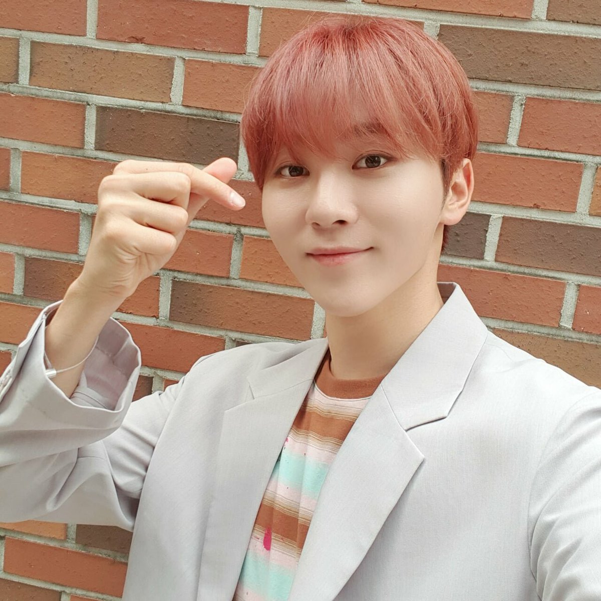 seungkwan with red hair; a thread