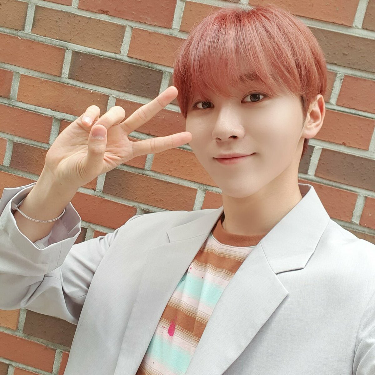 seungkwan with red hair; a thread