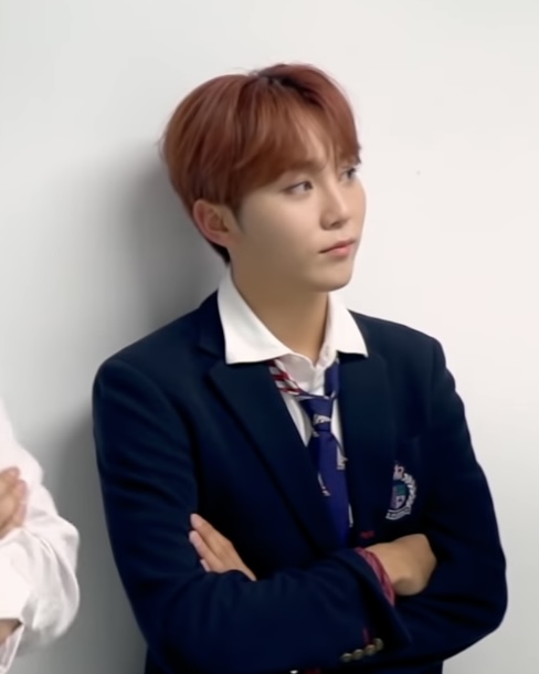 seungkwan with red hair; a thread