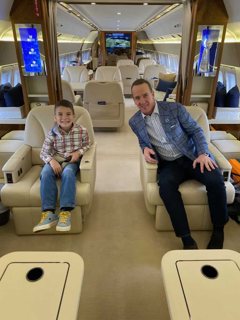 bstokley14's tweet image. Peyton and his son Marshall on their way to Tampa Bay Friday!!! Hall of Fame time