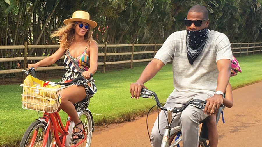 Beyonce, Jay Z, and Blue Ivy on bikes.