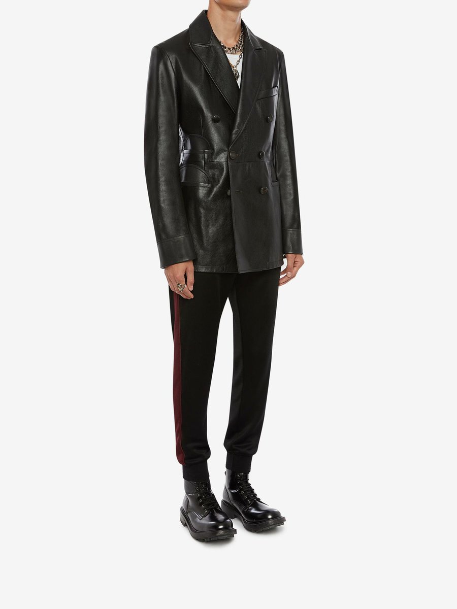 Jungkook in this-Being in the center, the Complete Leather double breasted coat will definitely put all eyes on Jungkook - the leather belt will greatly show off his toned waist and chest, but will not take away from his arms or face.