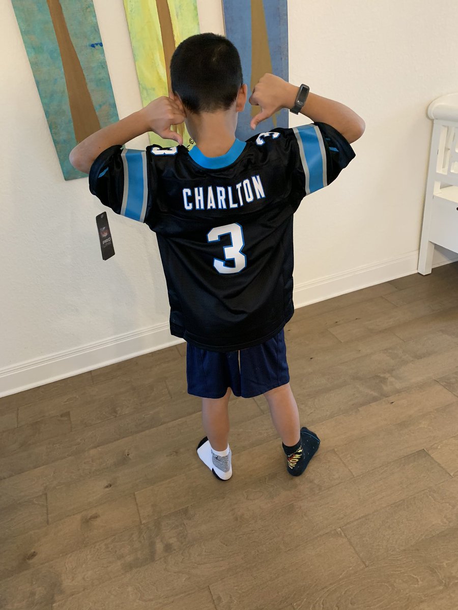CoachHutzler's tweet photo. When your dad is a Special Teams Coordinator your first NFL jersey is a Punter! @ritzcharlton_ #PACK https://t.co/JCXrOYejnM