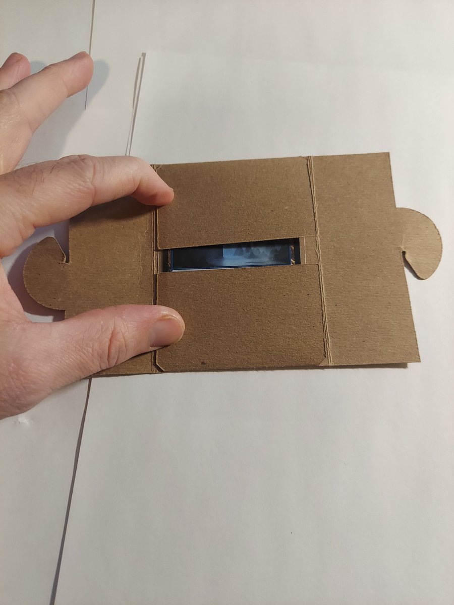 ShippingShield's tweet photo. While we wait for the restock, let me show you the first prototype of the Shipping Shield...  Doesn't quite look like the finished product does it :D  Big perk was no glue, bad part was more expensive, thicker and a little clumsy to use.  I still kind of like the design though :) https://t.co/f1Fa26BDnH