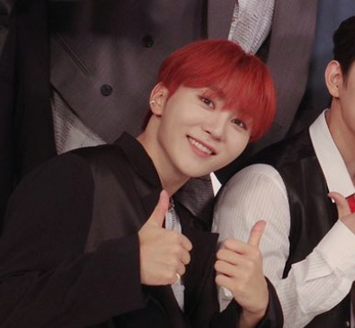 seungkwan with red hair; a thread