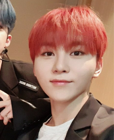 seungkwan with red hair; a thread