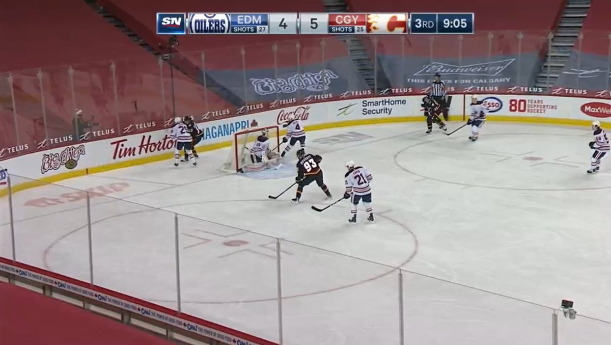 Goal 6: On Russell/Draisaitl. On the zone entry, Bouchard is marking Monahan, Russell on Gaudreau and Drai on Bennett. When the puck goes behind the net, both 29 & 4 head to Gaudreau (29 is able to finish a check/4 caught in no man's land)