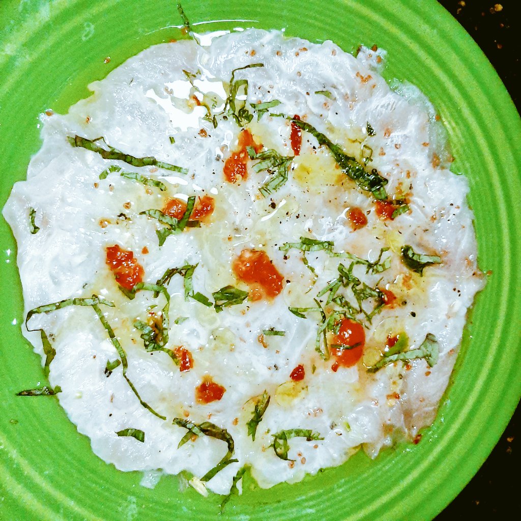 FoodieGrizzly's tweet photo. Leche de Tigre is a Peruvian Ceviche. Red snapper crudo prepared capaccio style but fish is too delicate to be pounded too thin. Lime mignonette turns it silky milk. #Foodelicious
#foodie #delicious
#foodphotography #food
🌶
@Living_Lou @foodiekk @sguetg @missk831 @junedarville https://t.co/PQErf2jJA8
