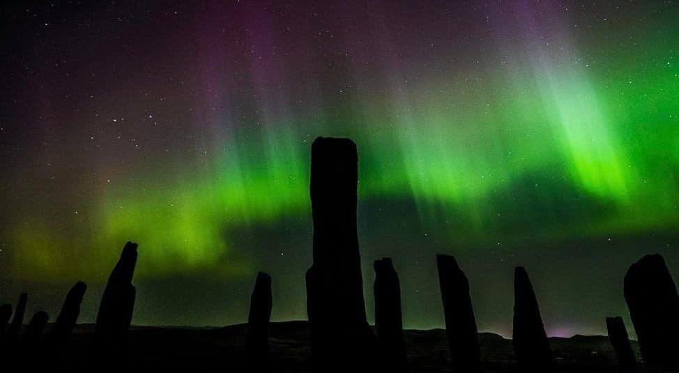 The Callanish Standing stones on the Isle of Lewis, Outer Hebrides under the Northern Lights.