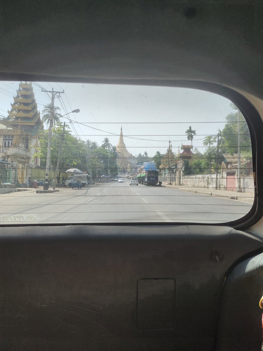 Police personnel carriers at Shwedagon Pagoda. Rumors are that the monks will demonstrate there and turn over their alms bowls. This is a powerful symbolic gesture that precipitated the violence against monks during the Saffron Revolution in 2007.