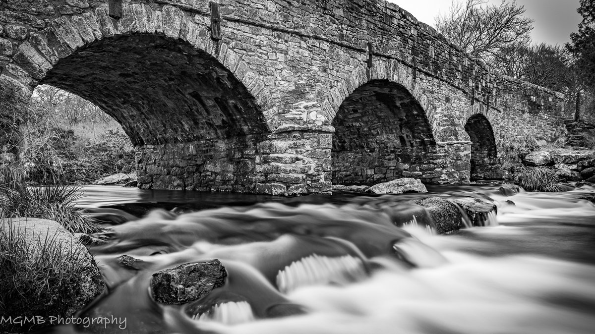 MgmbPhotography's tweet photo. This is the other bridge at Postbridge on Dartmoor, UK. Once again the B&W image brings out the the texture and mood of the granite stones. Thank you all who have liked my Clapper Bridge image. I hope you like this too ? #postbridge #Dartmoor #bridgeimages #bridges https://t.co/LTBreiGikL