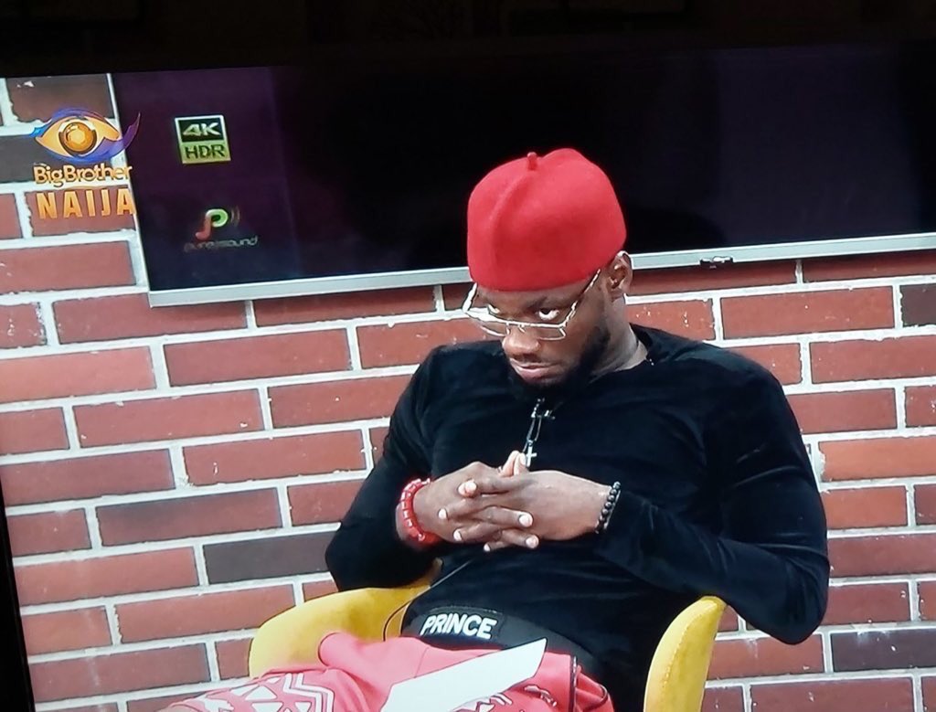 (she staggers to the sitting room)Pre: egbo Sule, what are you doing here?Aunty Dupe: you didn't tell me you've now become iya osun oh (paused) do you you know this man before?