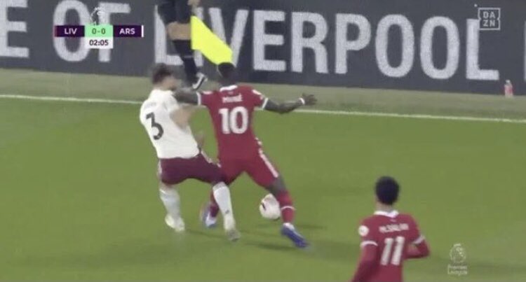 Mane was only given a yellow card for this elbow to the face on Tierney