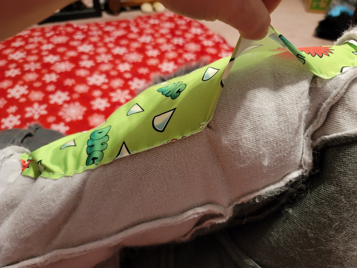 I mean, the stitching/fabric is secure. On the same note though, if I were to pop a stitch its all coming off because it appears to just be one long string of thread. The hole is where I would add/remove the polyfill.