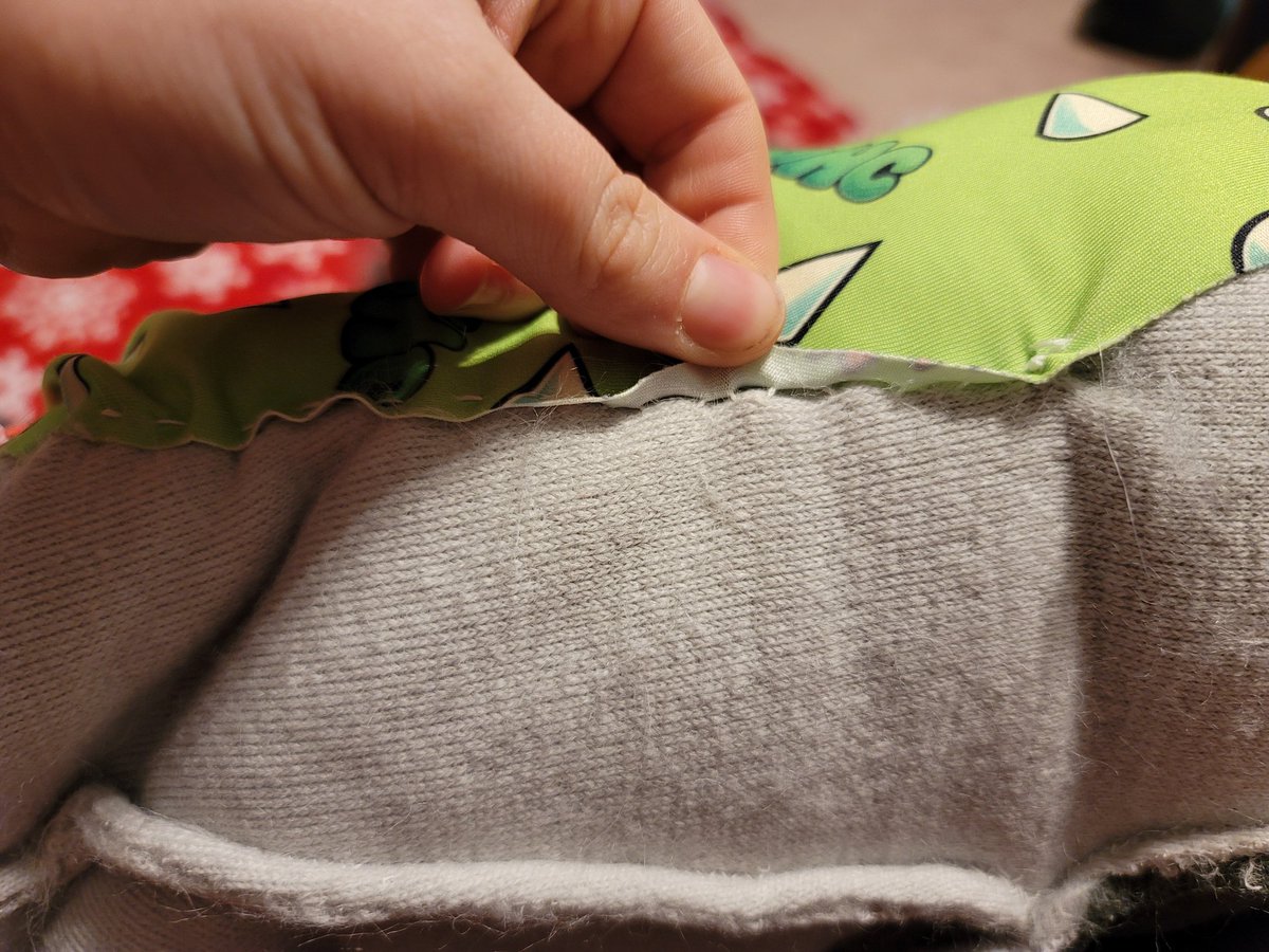 I mean, the stitching/fabric is secure. On the same note though, if I were to pop a stitch its all coming off because it appears to just be one long string of thread. The hole is where I would add/remove the polyfill.