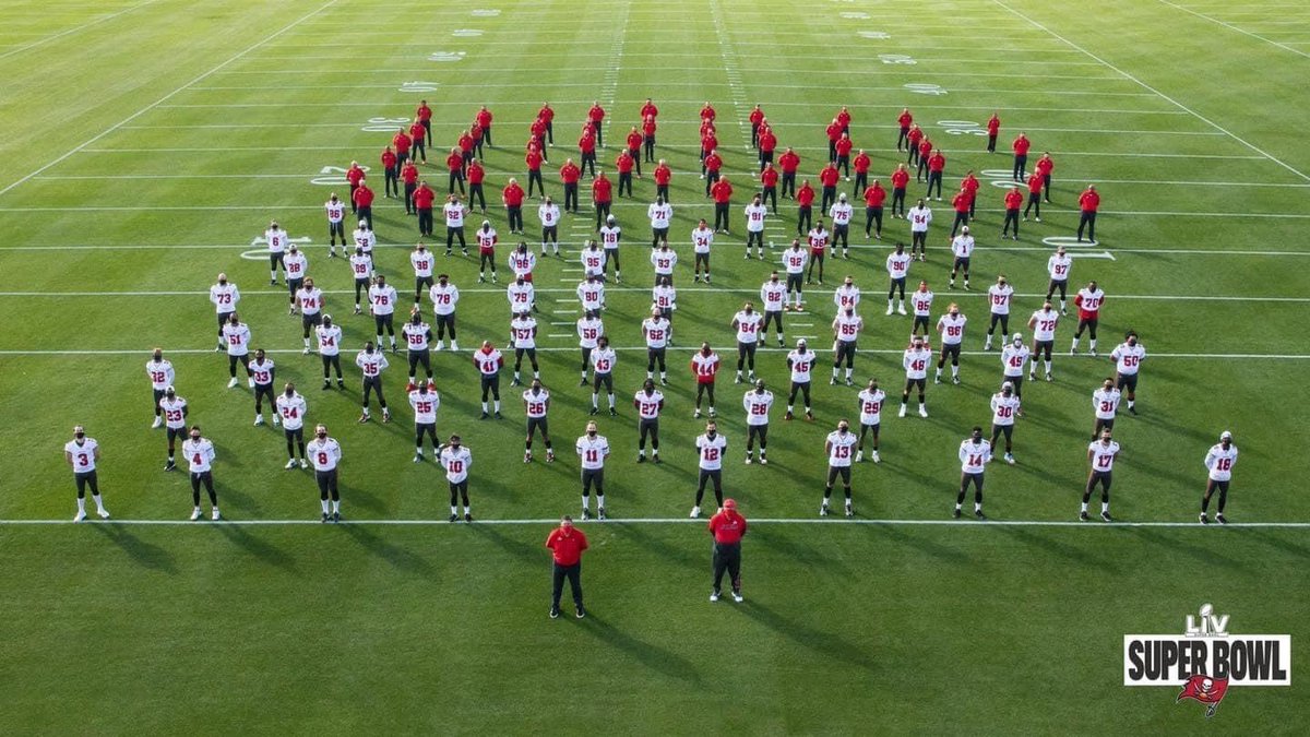 flatrockband's tweet photo. You would think that a Super Bowl team could afford to hire a Band Director to line up their team photo. Mr. E. would have done it for free. #warh #guideleft #pythagoreantheorem https://t.co/SM883YNtIB