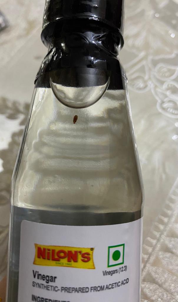 UTKARSHDEMBLA's tweet photo. @NilonsIndia
Trusting a brand has failed badly
Received a bug in Nilon’s Vinegar. It’s sheer luck dat it was visible bcoz of transparency. 
Attaching proofs of sealed bottle so dat any1 going for Nilon's thinks twice as they seem to be least bothered of consumer’s health https://t.co/1TaYXqy14d