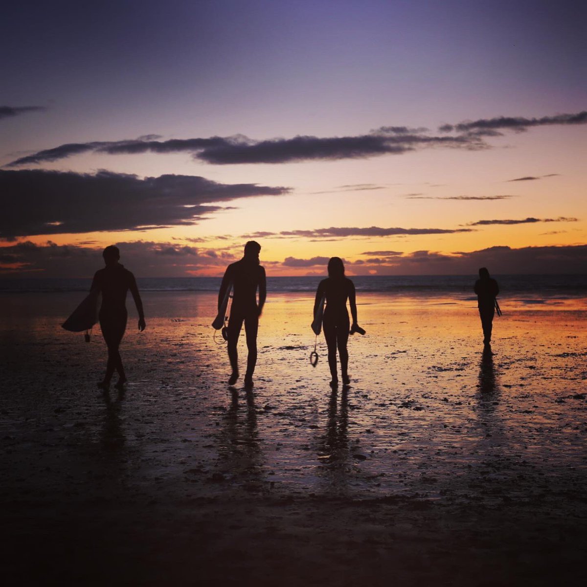 Sunset surfers outside the Watersplash in St Ouen’s, Jersey #Jersey #JerseyCI #surfers #sunset #channelislands