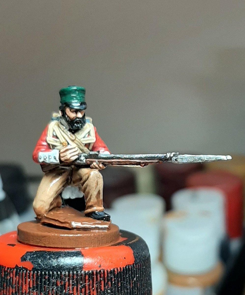 All the colours are taken up to the third level, metal areas highlighted and final woodgrain painted on.For me this is my favourite part of the painting, sort of brings the figure to life.Then its time to gloss varnish the figure.