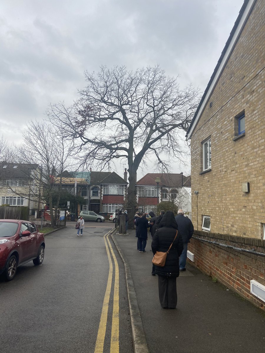 When I arrived this afternoon for the second Sunday shift (clinic was open 8am - 8pm) people were queuing to get in. But even outside work was being done: volunteers were filling out questionnaires involving name/ date of birth/ NHS number & ethnicity for each person.