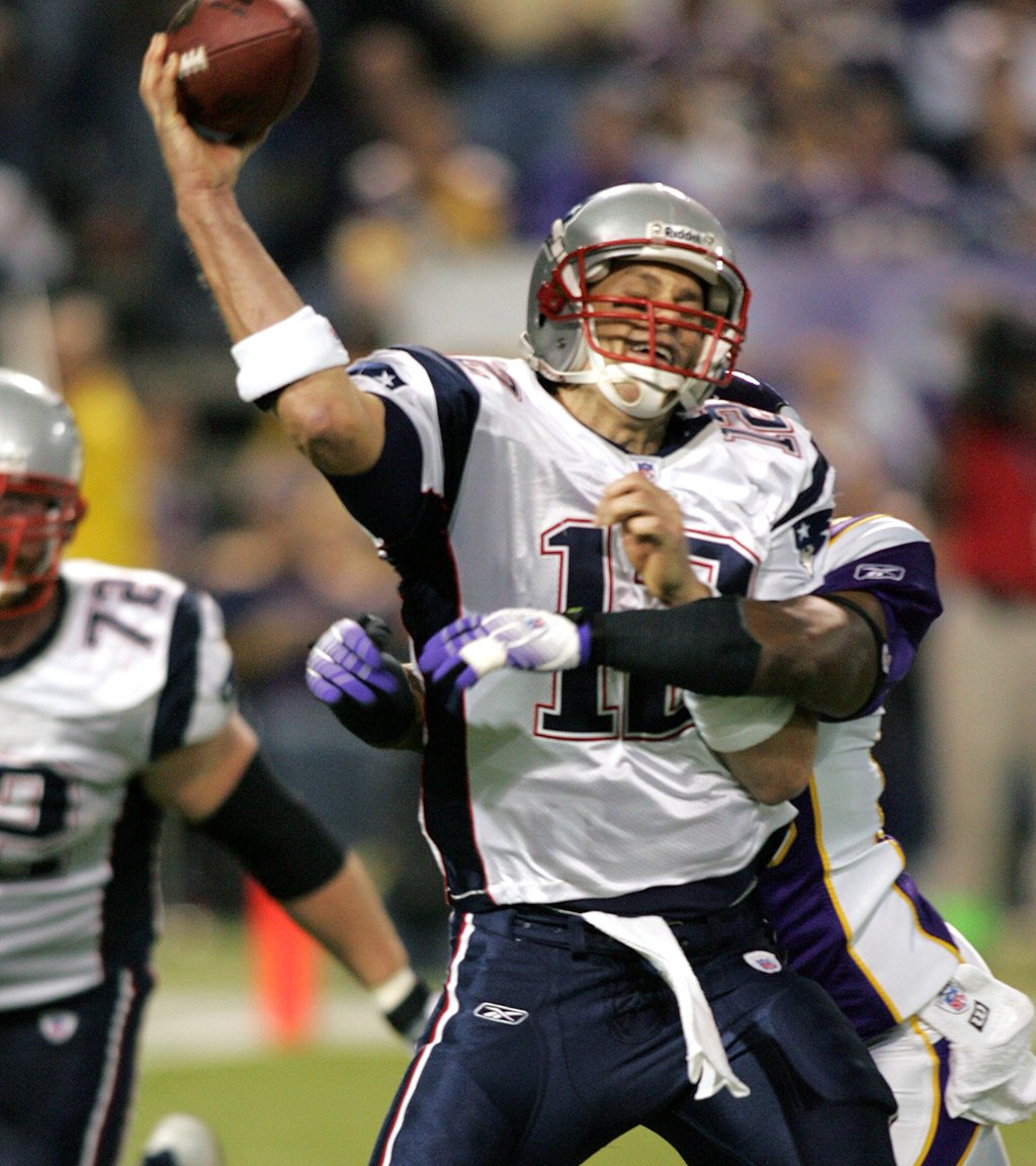 The Sporting News on X: 'Here's a photo of Antoine Winfield Sr. sacking Tom  Brady. And here's a photo of Antoine Winfield Jr. getting an interception  in the Super Bowl to help