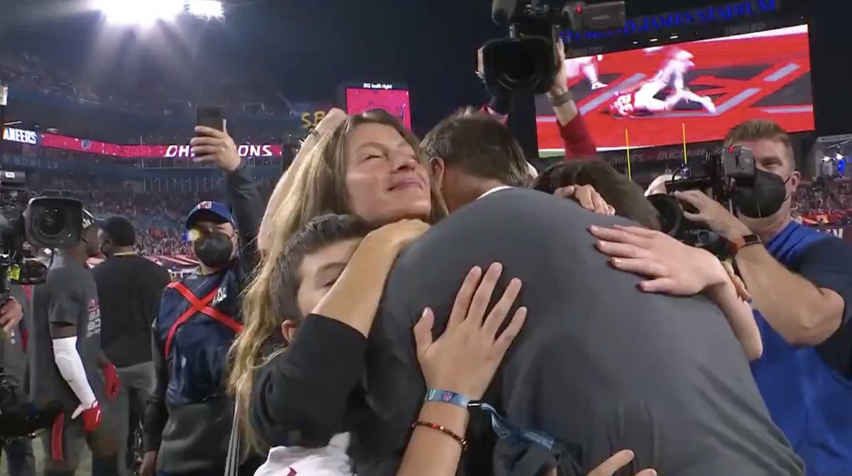 espn's tweet photo. Tom Brady gets a postgame hug from his family ❤️ #SuperBowl https://t.co/EhRBus3vmE