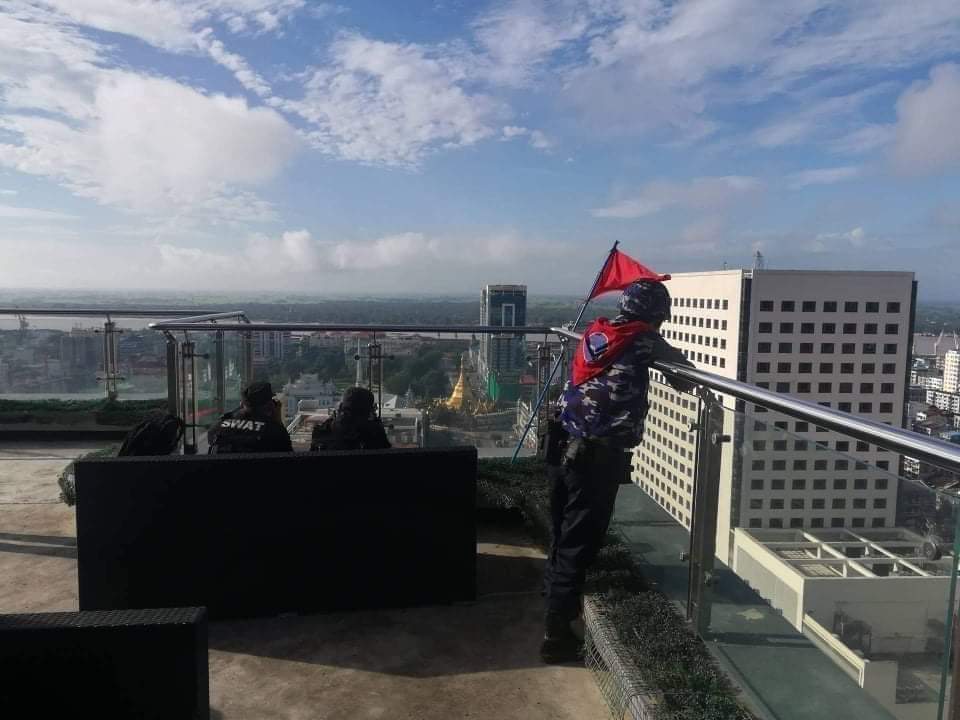 Wei_Wei_96's tweet photo. Police snipers are stationed at the highest points of the city as protest for democracy intensifies. Go tweet and let the world know! These pictures need to go out everywhere! 
#SayNoToMilitaryCoup
#RejectMilitaryCoup https://t.co/YBPwGOJAop