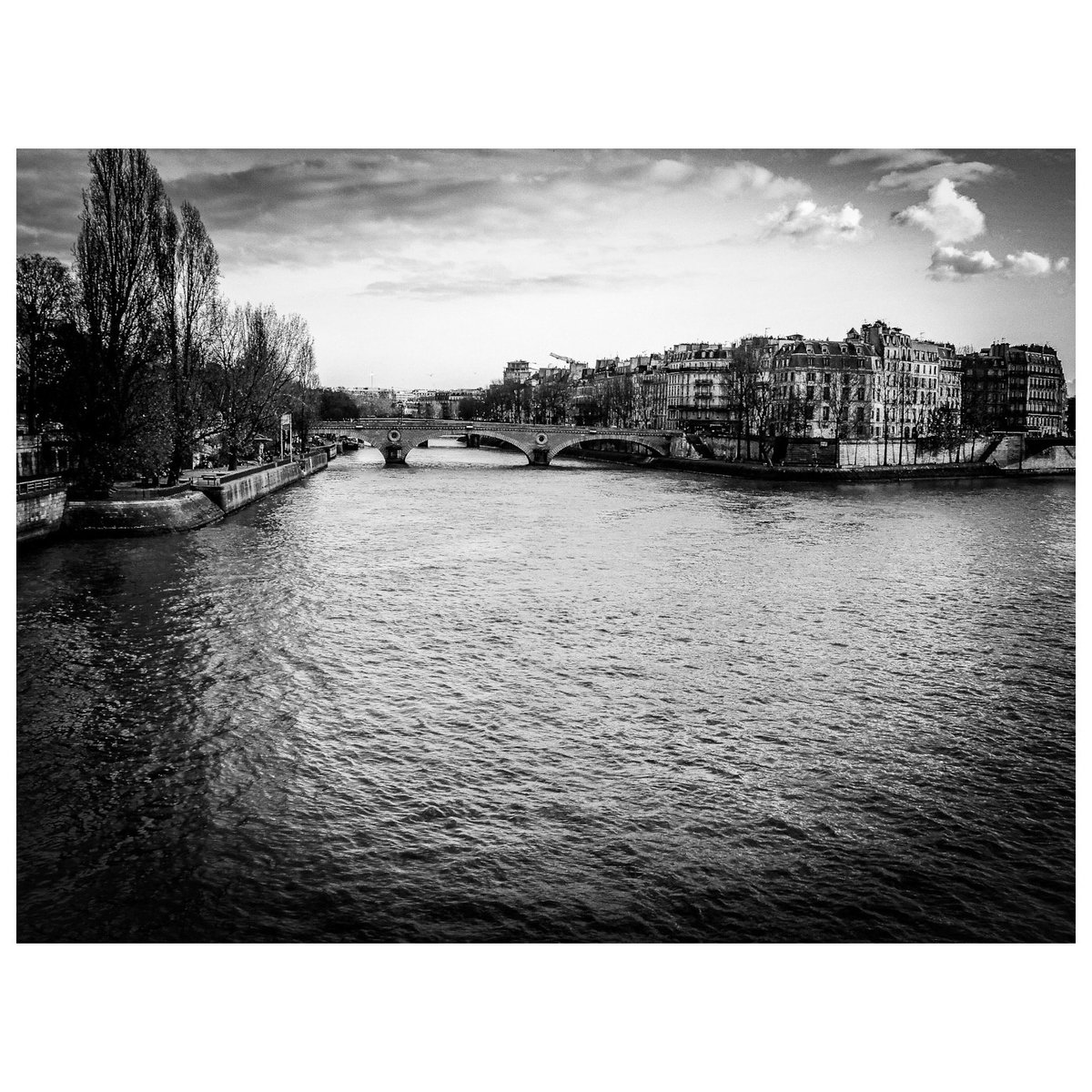 Looking at the city of Paris as I walk by shot on my Canon #photography #photooftoday #streetgraphy #blackandwhitephotography #paris #france