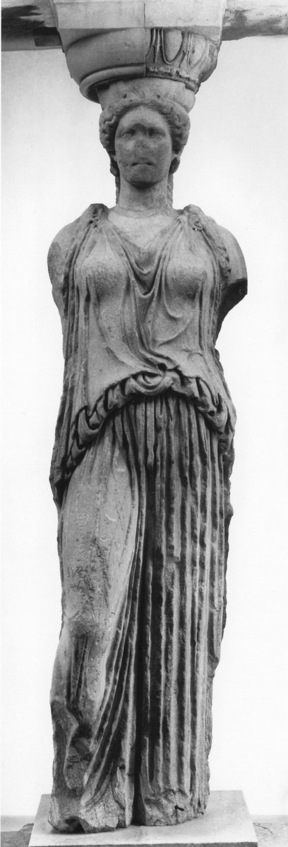 Actually, the Fat Lady's attire is an interpretation of the Caryatid's dress (shown here by an original kore in Athens and a better preserved Hadrianic copy from Tivoli). Her chiton has been adapted by adding one button turning it from a sleeveless into a loosely sleeved one.