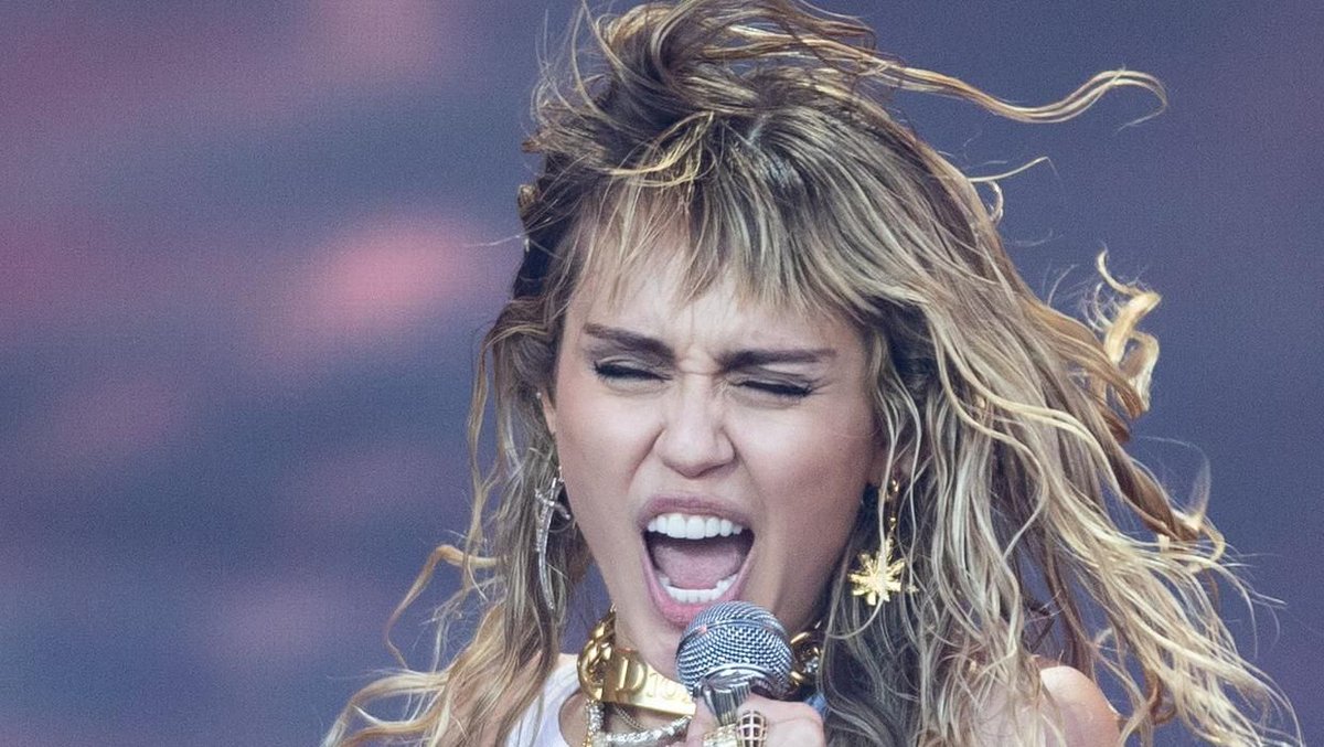 Super Bowl Emotional Miley Cyrus fights back tears during pre Super Bowl performance