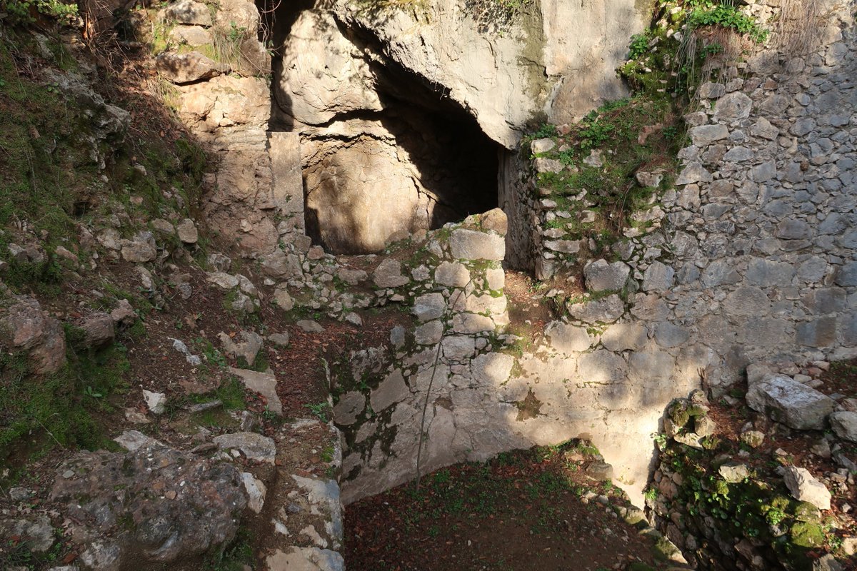 4/10 West of the ruins are the remains of a cistern, likely used in the Byzantine period, and supplied by a natural spring coming through the rock and into a cave. There is a small channel that runs out of the cave, and interestingly still provides water to farmers in the area.