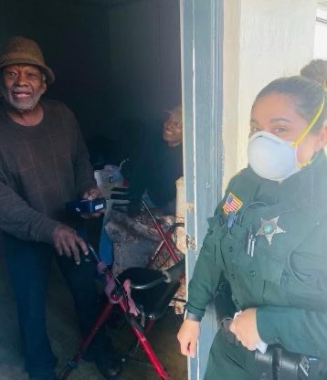 PBCountySheriff's tweet photo. The other day an elderly man had his wallet snatched from him. We were able to locate the items inside but not his wallet. 

So one of our deputies surprised him with a new wallet &amp; he said it was better than his last one. He was so happy, it was contagious. #PBSOserves https://t.co/qG5MdiUEOK