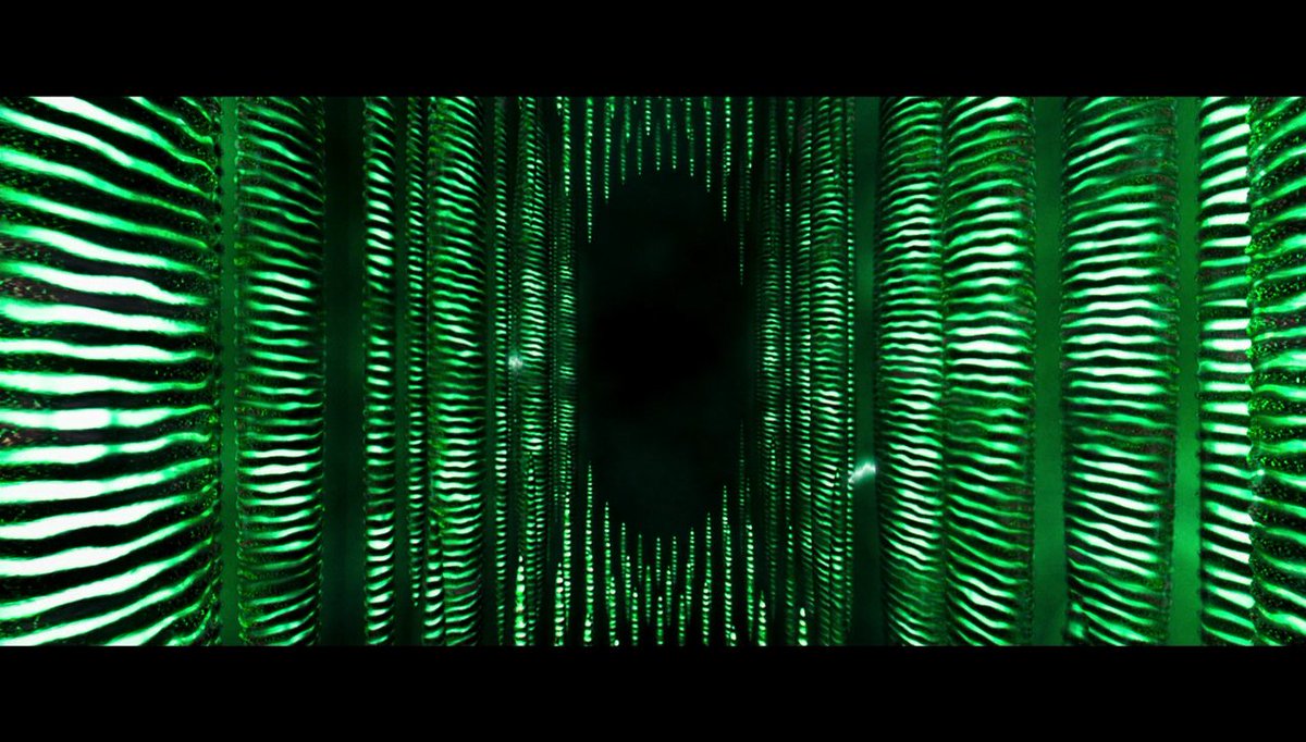 Another cool detail: Remember the opening shot as it goes through the numbers?Notice the striated light ridges of the Matrix code at an electron level?Looks an awful lot like when Cypher betrays their location and they have to go inside the walls to hide from the Agents.9/