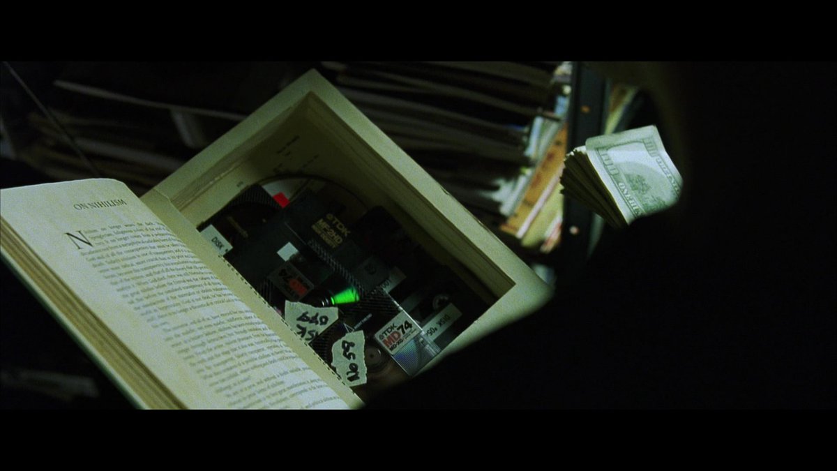 The book in Thomas Anderson's apartment where he keeps all his hacker discs and cash is entitled Simulacra and Simulation, by French philosopher Jean Baudrillard. Simulacra and Simulation explains how a modern "system of control" comes into being and sustains itself.11/