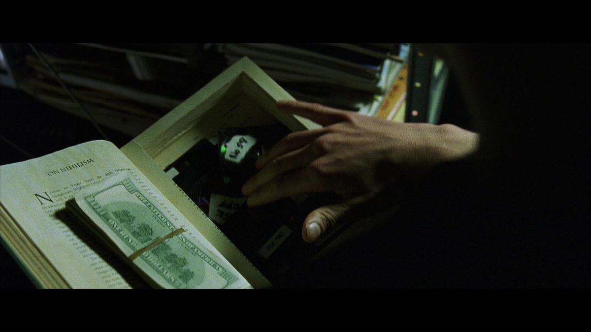 Interesting that the Jujitsu training program disc looks similar to the disc that Thomas Anderson hands Mescaline Guy outside his apartment.Maybe not that interesting. 13/