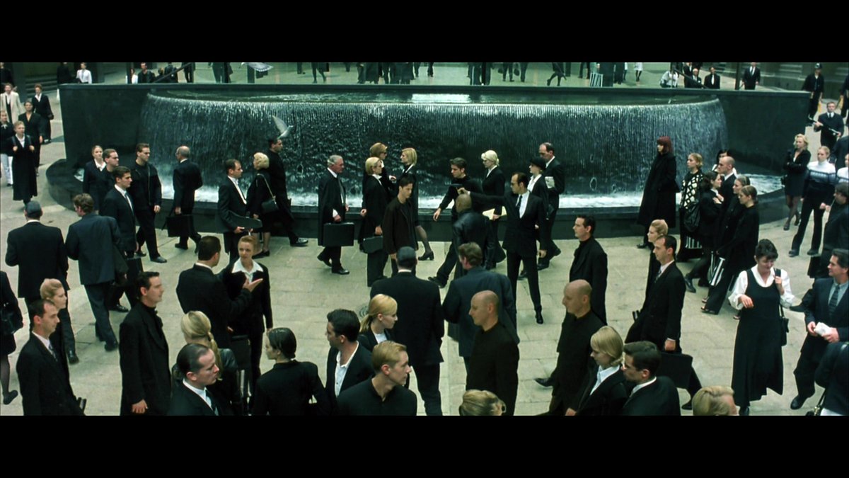 Remember the Agent Training program and the Woman in the Red Dress? That scene has loads of twins in it. Which is pretty cool. You only get a really good glimpse when they go wide with it. But you do see a load of black-suited automatons, including nuns and sailors.14/