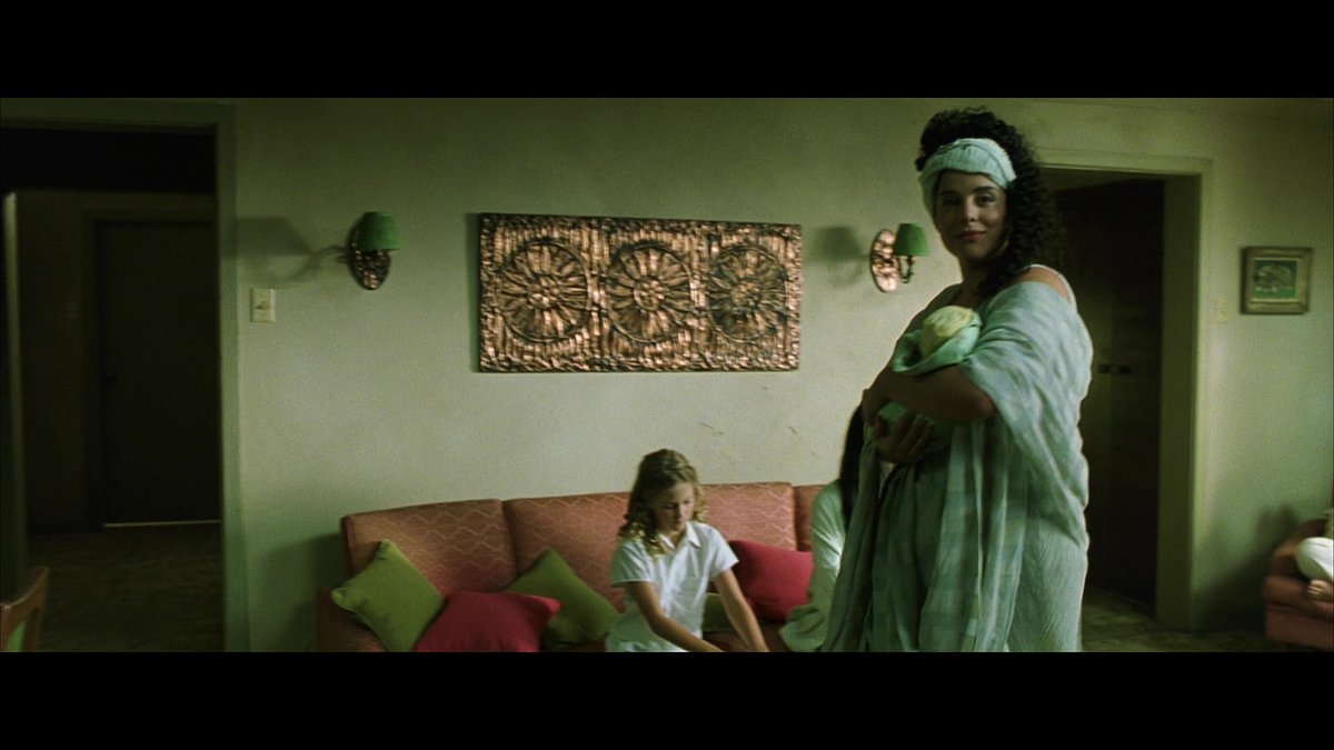 And more patterns, this time inside the Oracle's apartment.I'd argue the beads at the kitchen entrance form a kind of 1-0-1 pattern, with Neo in the middle. Also temple-like entrance.Am I pattern-finding? Or pattern-matching? W/the Wachowskis, I am never sure.19/