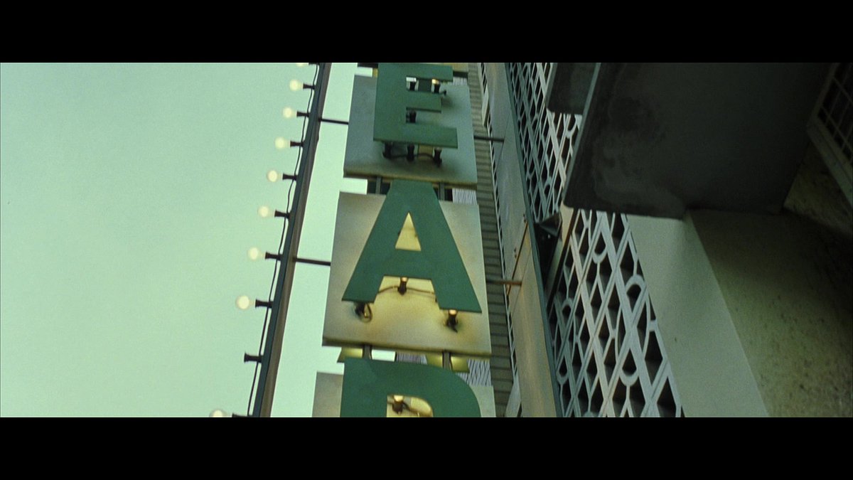 So what's the significance of the AWA letters? I believe the Wachowskis deliberately are retrofitting this sequence of letters as a storytelling signal.You may or may not recall the hotel in the opening scene and then at the end where Neo realizes he's the One. 5/