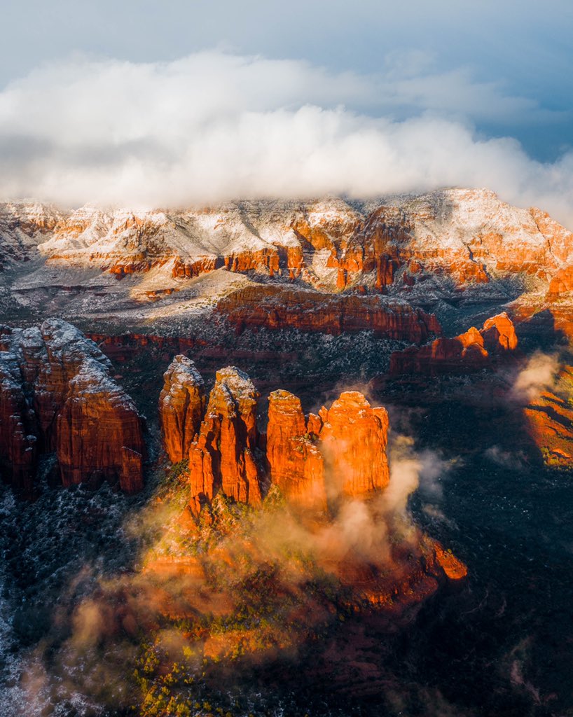 Low clouds and red rocks