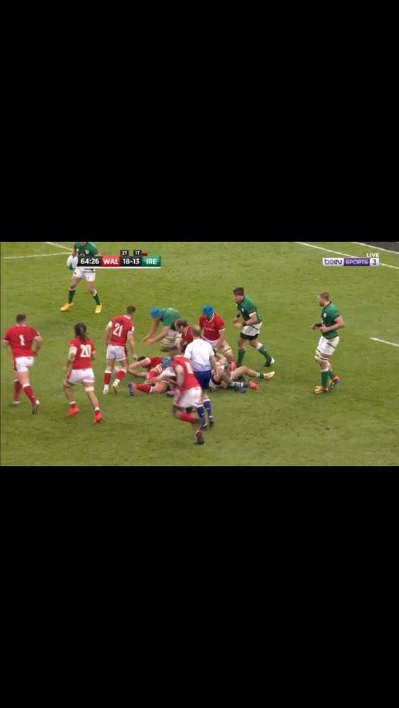 Ball carrier on the ground. Three Welsh players and one Irish player on their feet in contact over the ball.No longer a tackle. A ruck. No tackle zone applies. The ruck is over as soon as the ball leaves and anyone behind their offside line, like Tadhg Beirne, may play it.