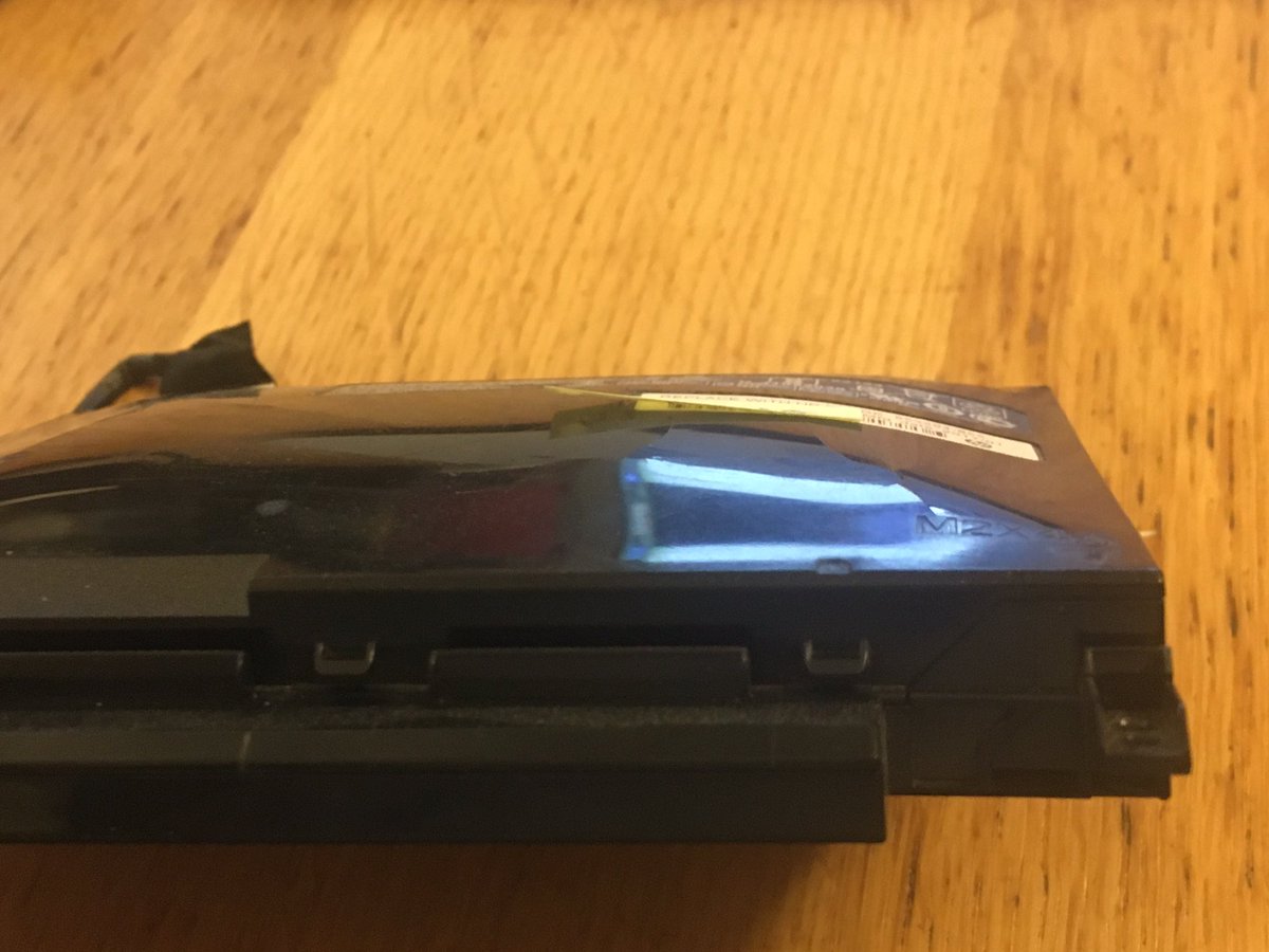 Chinese_Dave's tweet photo. HP Support told me that this Omen laptop battery swelling with gas was “normal, expected and safe” it wasn’t specifically on the huge battery recall list from 2017. You can plainly see growing pressure crack and you’re saying it’s safe for my teenage son to do his school work on? https://t.co/E6uHzgslqe