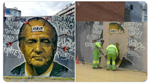 Miserr11's tweet photo. Ayer en Barcelona se hizo ese mural en defensa de Pablo Hasel que pronto habrá de entrar en prisión peor decir cosas como esas.
Hoy las brigadas del Ayuntamiento de Comuns-Socialistas la retiran.  
Colau blanqueando a la monarquía. Vaya mandato que le está quedando. https://t.co/qkZQ6ylG6E