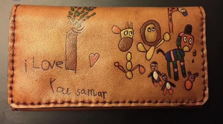 briansolis's tweet photo. This story...wow.

A 6 year-old boy lost his life in a car accident. His drawings and story caught the attention of a leather maker, who turned the young boy's art into a wallet as a special gift for his mother. 🥺😭❤️🙌

@Nafadileather
via @Goodable 
#Humanity https://t.co/FvUOdlc6az