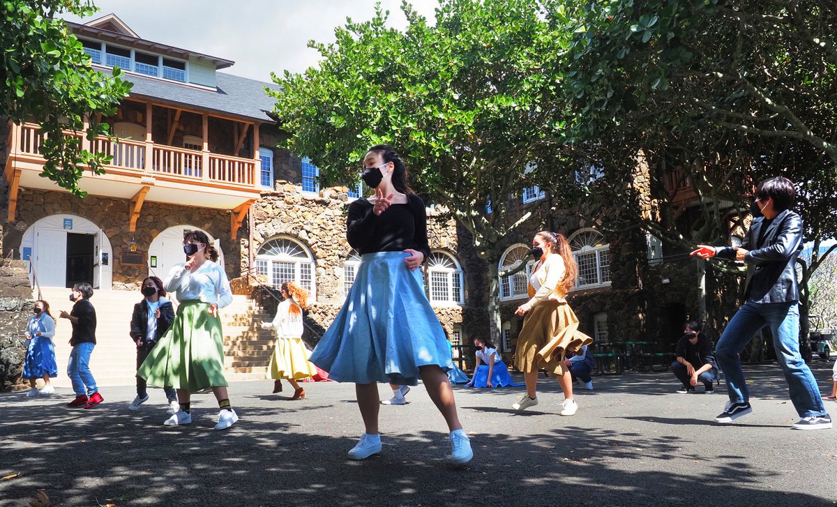 In the dappled sunlight in front of Kawaiaha'o, Mid-Pacific musical theatre/vocal ensemble students rehearse a scene from "Grease," as they prepare for their spring virtual performance! #staysafe #owlstrong #midpacific