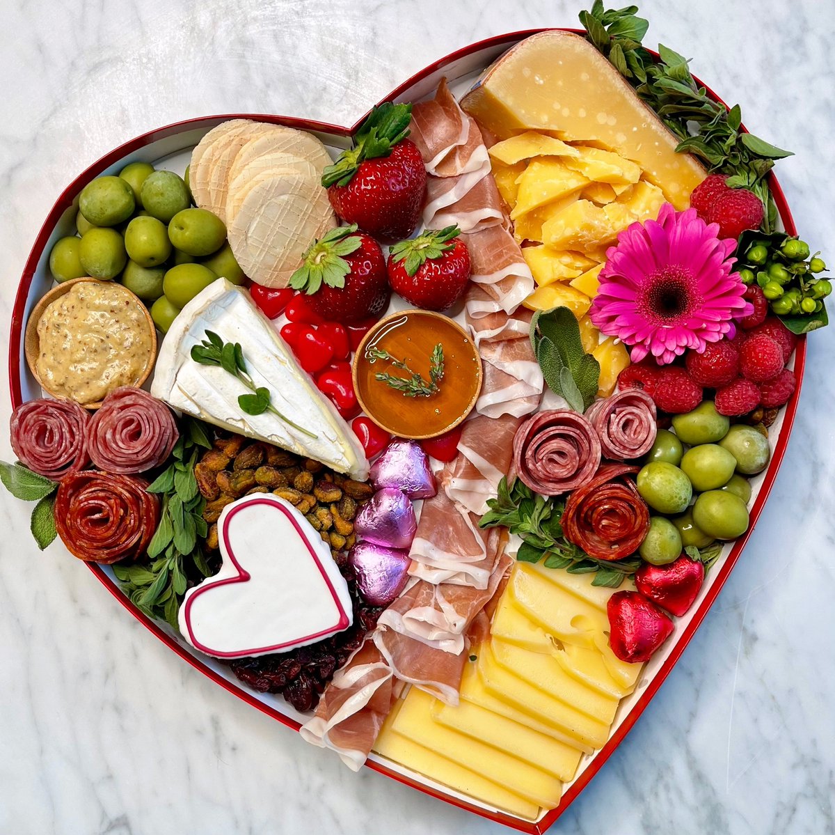 Who says red heart boxes *have* to be filled w chocolates? ❤️

Check out my latest post: "7 Fun Valentine's Idea's for Cheese Lovers" including tips to build this HeartCuterie platter of their cheese-dreams 🥰

iloveimportedcheese.com/7-valentines-i…