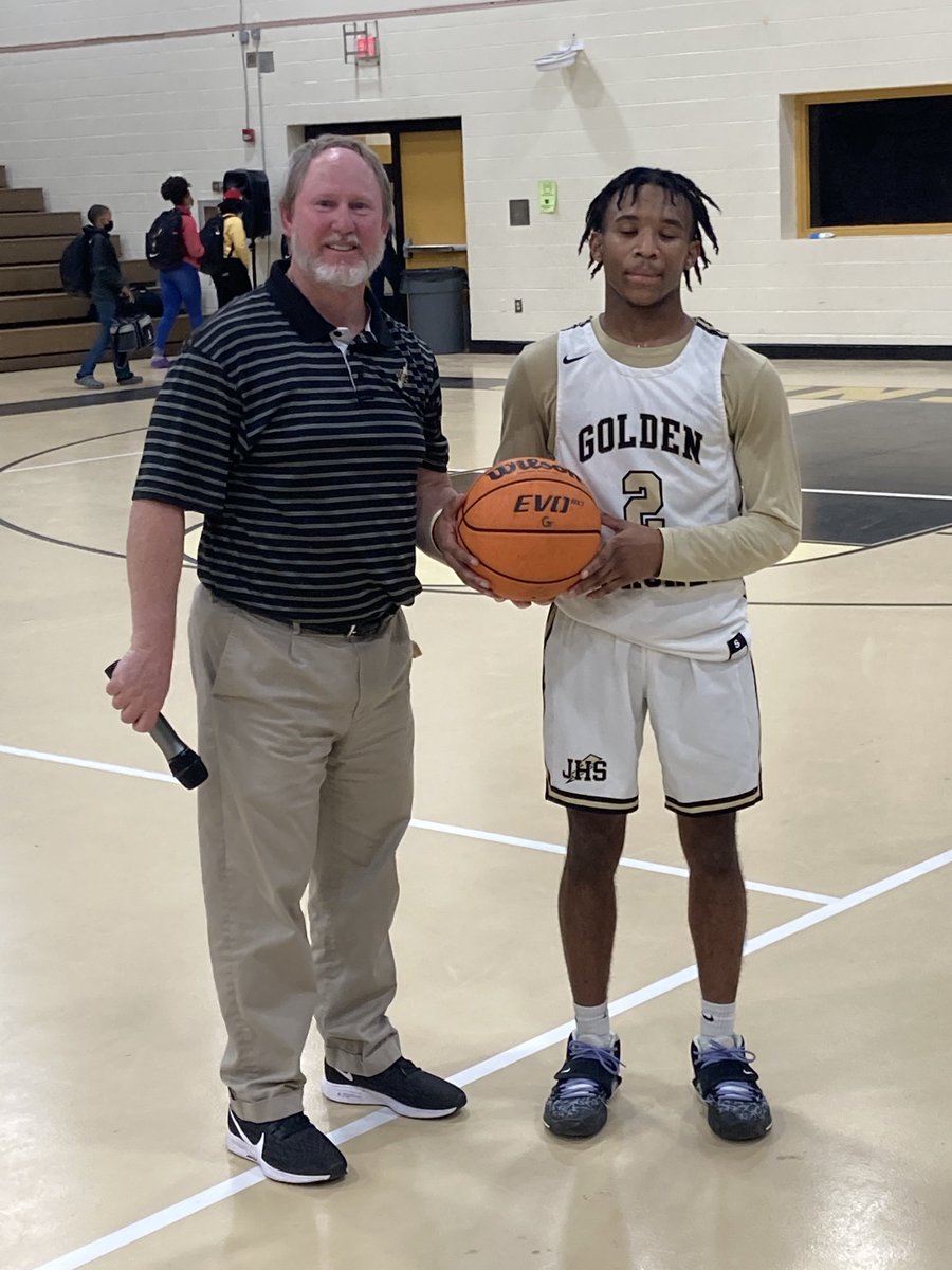 FlashesNation's tweet photo. Quez Lewis is recognized after tonight’s victory over Lake View for his accomplishment of scoring over 1000 points in his career at JHS.  Let’s Go Flashes! https://t.co/YV9aWFs5MB