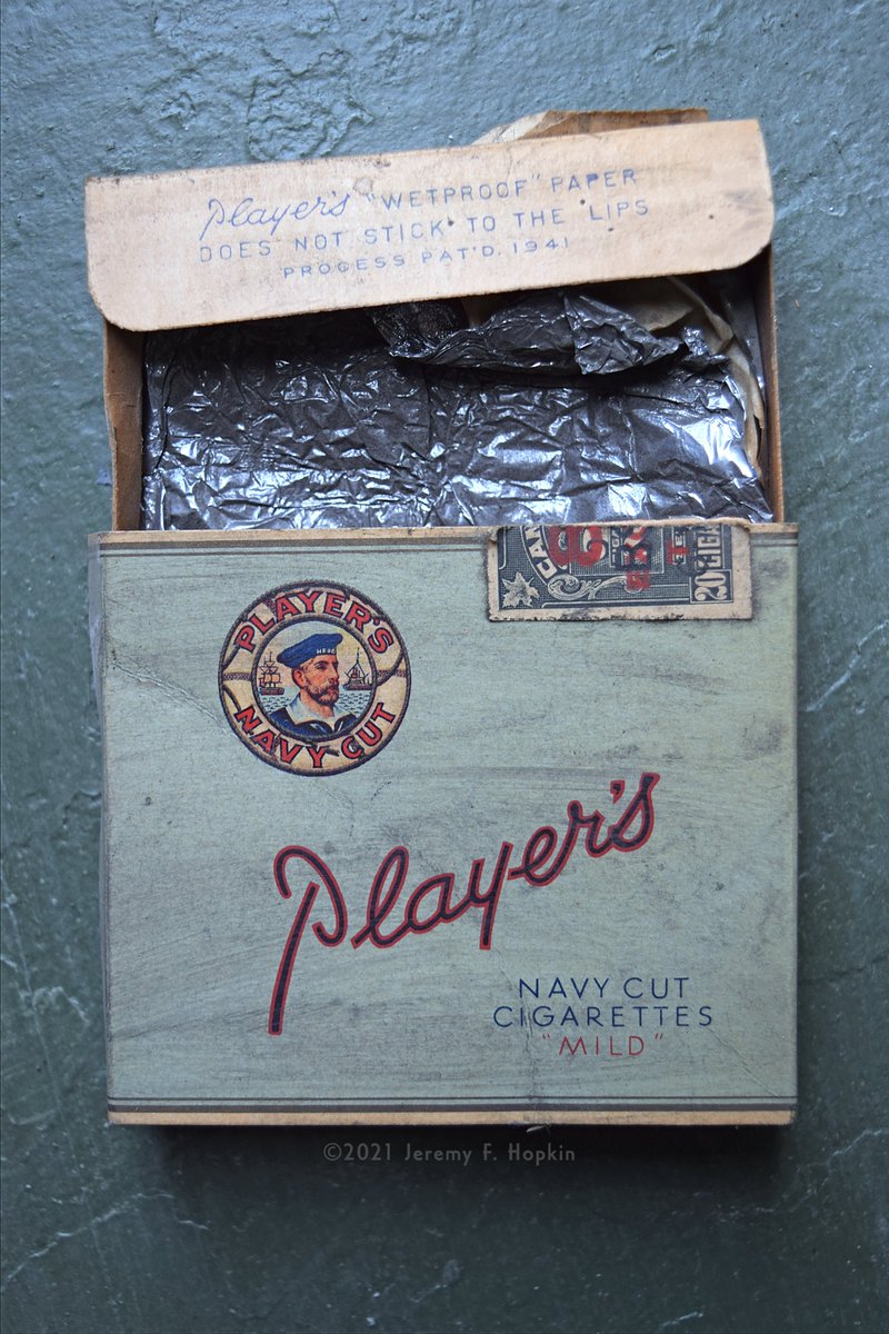 Player's Navy Cut cigarette package, c.1940s. I love the "Does Not Stick To The Lips" text.The tinfoil of the past was definitely stronger than what they put in the cigarette packs of more recent years.
