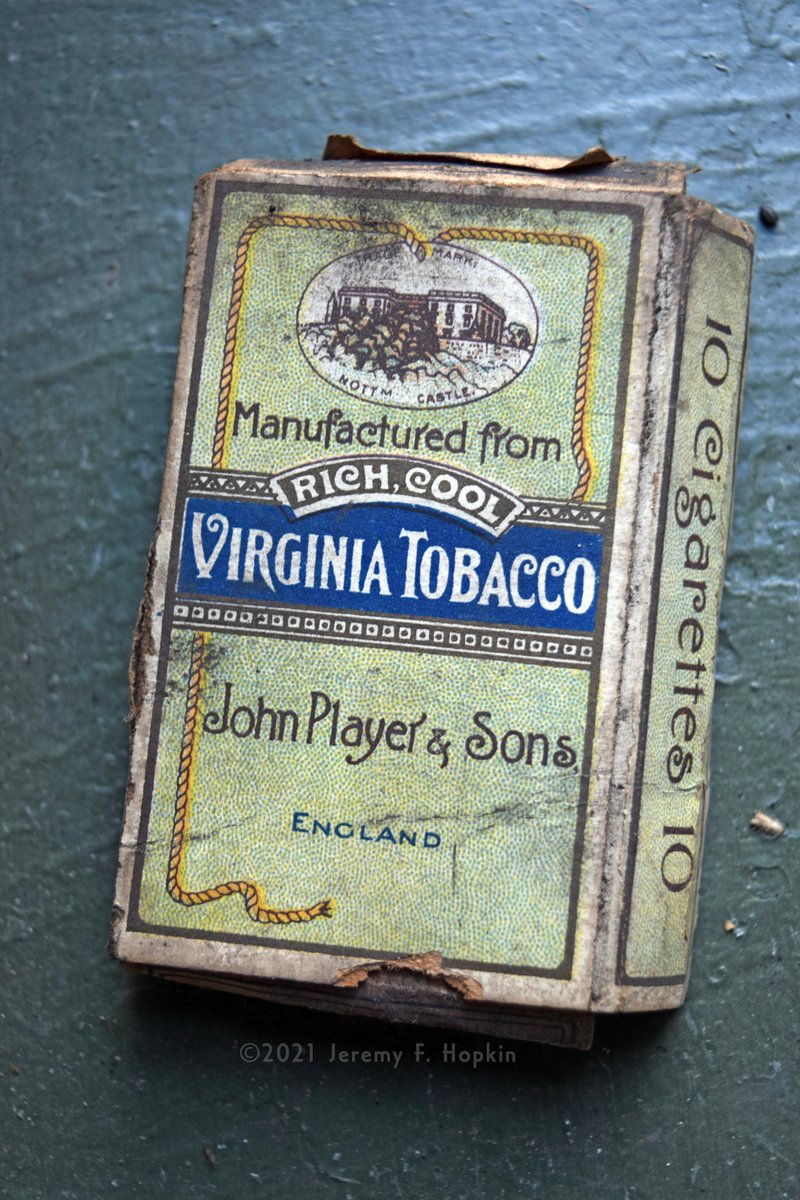 Front side of a Player's Navy Cut cigarette package, c.1920s. Fairly certain this one had been up there since the day the Parkdale Theatre opened, or maybe even during its construction.