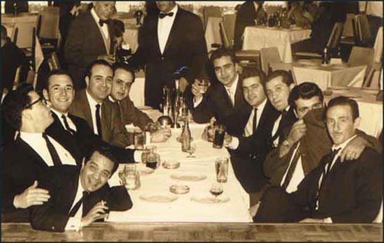 the only known photo of operation 40, the secret cia assassination squad established by dci allen dulles and tasked w killing castro, eventually to broaden focus and assassinate political operatives elsewhere. that’s felix in the bottom left , leaning over the table laughing