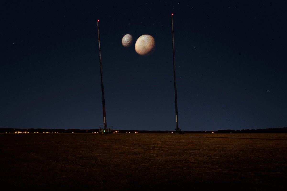 TheEmirates's tweet photo. Two giant 100-meter cranes and an advanced 40-meter screen were used to project ‘Phobos and Deimos,’ making them appear realistically in the sky and visible long distances 
#ArabsToMars
#ImpossibleIsPossible
#HopeForHope 🤲🚀🔴 https://t.co/AkIANCDOf9